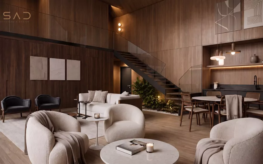 Lounge da villa com escada para o mezanino